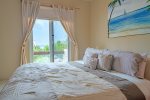 Master suite with king bed and ocean view